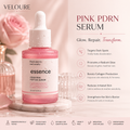 Veloure Pink PDRN Serum bottle with dropper on marble surface